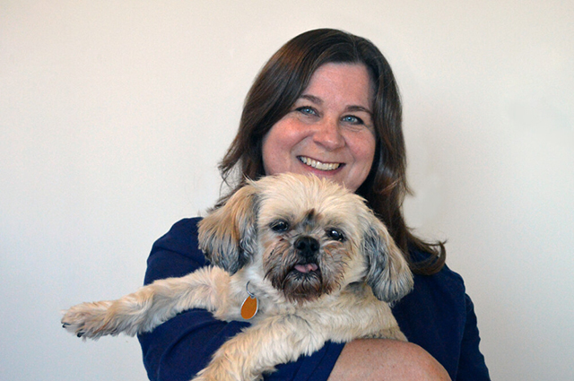 Sharon holding a dog